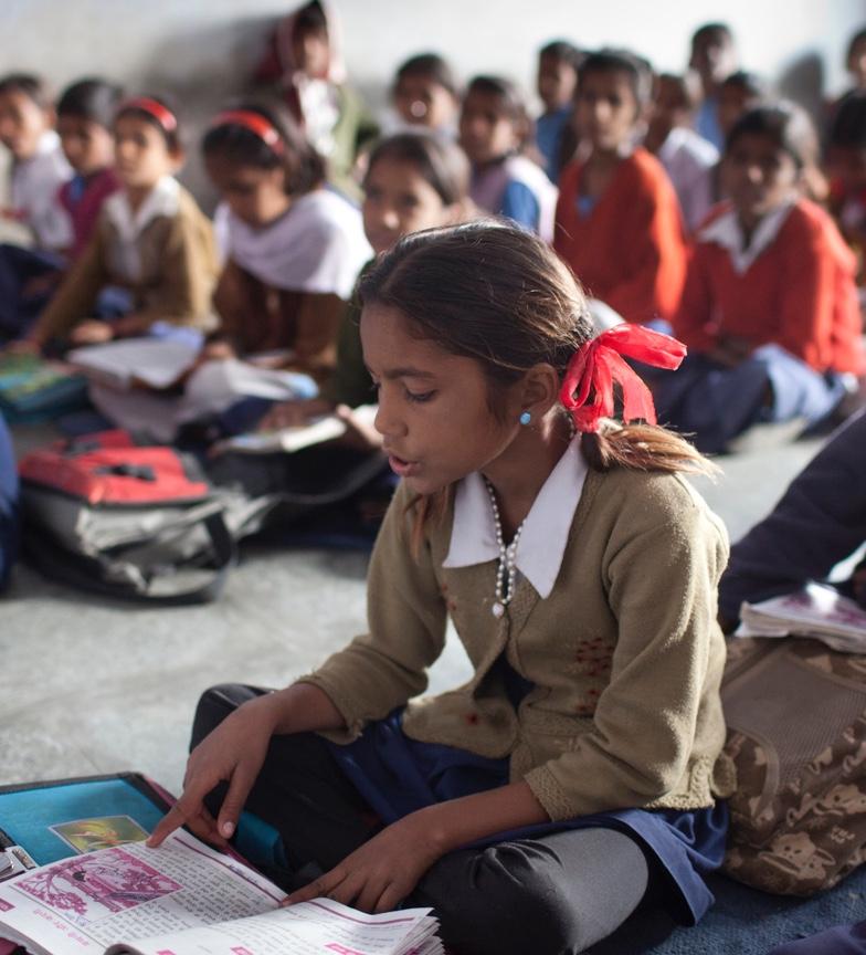girl reading in classroom